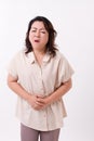 Middle aged woman suffering from stomach ache, belly pain Royalty Free Stock Photo