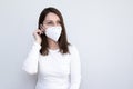 Middle-aged woman wearing medical mask brunette vaccination protection against coronavirus