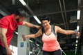 Middle aged woman working out with personal coach Royalty Free Stock Photo