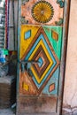 A decortaed door to a shop in the craft souk in Nizwa, Oman
