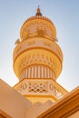 The minaret of a mosque in the desert of Oman