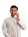 Middle eastern arab man using the telephone