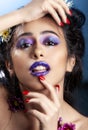 Middle Eastern Arabic beauty model with dark blue lips