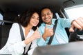 Middle Eastern Couple In Car Gesturing Thumbs Up Posing Inside Royalty Free Stock Photo