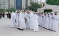 Middle Eastern Culture - Emirati Men performing Al Ayala traditional dance - Arabic men in traditional cloth