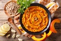 Middle Eastern food: pumpkin hummus with ingredients close-up. H Royalty Free Stock Photo