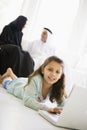 A Middle Eastern girl using a laptop Royalty Free Stock Photo