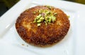 Middle Eastern Kunafeh Dessert on White Plate Royalty Free Stock Photo