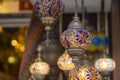 Middle Eastern lambas of different colors and sizes are hanging in the bazaar. Royalty Free Stock Photo