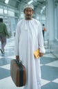 Middle Eastern man in airport terminal