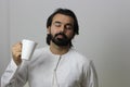 Middle Eastern Man Drinking Coffe And Enjoying The Taste With Closed Eyes