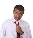 Middle eastern man fixing tie