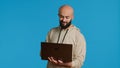 Middle eastern man works with cyber security on laptop Royalty Free Stock Photo