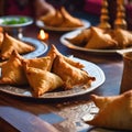 A Middle Eastern style room exudes warmth as samosas are served on the table for an Iftar meal during Ramadan