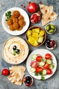 Middle Eastern traditional dinner. Authentic arab cuisine. Meze party food. Top view, flat lay, overhead. Royalty Free Stock Photo