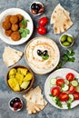 Middle Eastern traditional dinner. Authentic arab cuisine. Meze party food. Top view, flat lay, overhead. Royalty Free Stock Photo