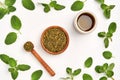 Middle Eastern zaatar spices with fresh zaatar leaves and olive oil . Top view with copy space Royalty Free Stock Photo