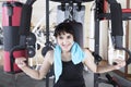 Middle easterners woman with a weight machine