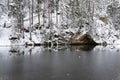 N the middle of the forest is a cliff with a reservoir of water Royalty Free Stock Photo