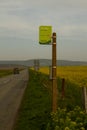 A middle of nowhere bus stop sign located in the middle of nowhere Royalty Free Stock Photo