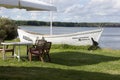 Middle part of white wooden boat close calm Lagoon Relaxing Landscape Royalty Free Stock Photo