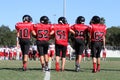 Middle School American Football Team Captains Take the Field for Coin Toss Royalty Free Stock Photo