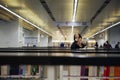 Middle school girl reading in library