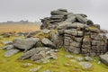 Middle Staple Tor looking up to Great Staple Tor with mist rolling in over the top, Dartmoor National Park, Devon