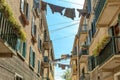 In the middle of Venice, clotheslines with laundry are stretched between the rows of houses Royalty Free Stock Photo