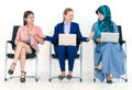 Middle Woman stoping team from fighting in office Royalty Free Stock Photo