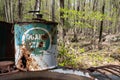 MIddletown, CT, USA - May 9, 2020 - Quaker State old, antique, rusted oil can out in wilderness.