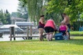 A group of overweight and obese people at a park highlighting the need for fitness, diet, and nutrition