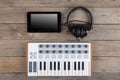 Close up of MIDI controller volume fader, knob and keys. Royalty Free Stock Photo