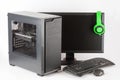 Midi tower computer case with led monitor on white background. Royalty Free Stock Photo