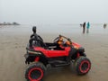 Midnapur, West Benga,India 1st October: A seneic beauty of Mandarmani beach with a toy jeep and tourist's.