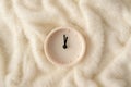 Midnight at clock on white soft fluffy fur background. Minimal time idea Royalty Free Stock Photo