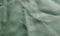 Midnight green wrinkled fabric texture for background