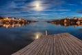 Midnight moon reflections over change Islands, Newfoundland