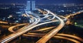 Midnight Motion - Night Aerial view of a freeway intersection traffic trails in night Royalty Free Stock Photo