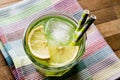 Midori Sour Cocktail with ice and lemon. Royalty Free Stock Photo