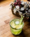 Midori Sour Cocktail with ice and lemon. Royalty Free Stock Photo