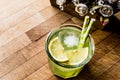 Midori Sour Cocktail with ice and lemon. Royalty Free Stock Photo
