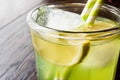 Midori Sour Cocktail with ice and lemon. Royalty Free Stock Photo