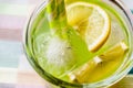 Midori Sour Cocktail with ice and lemon. Royalty Free Stock Photo