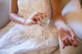 Midsection of bride spraying perfume on hand Royalty Free Stock Photo
