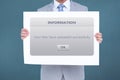 Midsection of businessman holding information sign Royalty Free Stock Photo