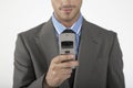 Midsection Of A Businessman Using Cellphone Royalty Free Stock Photo