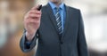 Midsection of businessman using felt tip pen Royalty Free Stock Photo