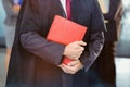 Midsection of lawyer holding law book Royalty Free Stock Photo