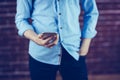 Midsection of man holding smartphone Royalty Free Stock Photo